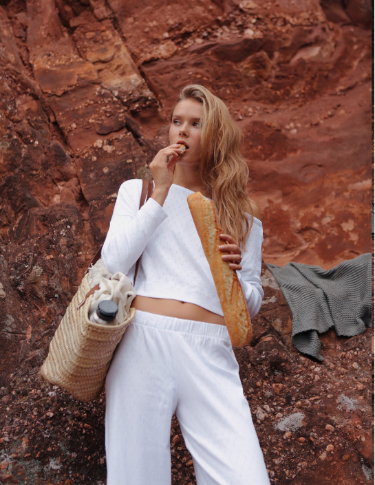 Set: Asymmetrical Long Sleeve Top and Flared Pants in White