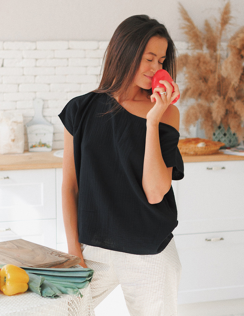 Black muslin T-shirt with an asymmetrical neckline