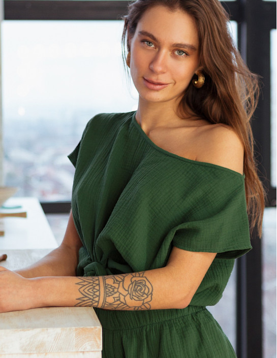 Green muslin T-shirt with an asymmetrical neckline